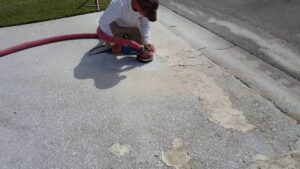 worker finishing concrete dry cement